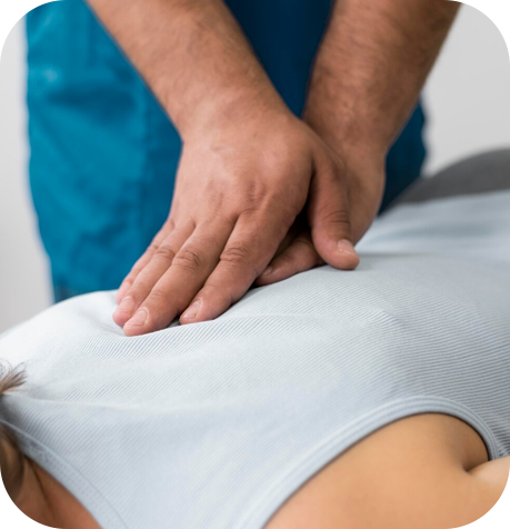 A male patient who is assisted by a nurse.