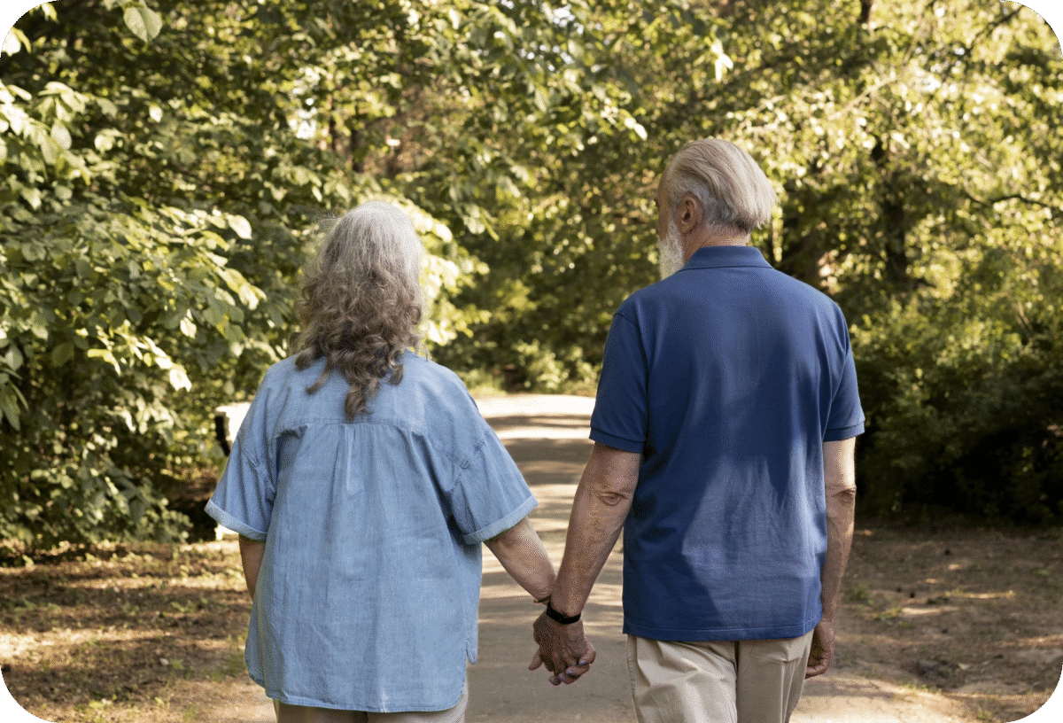 full-shot-couple-holding-hands@2x
